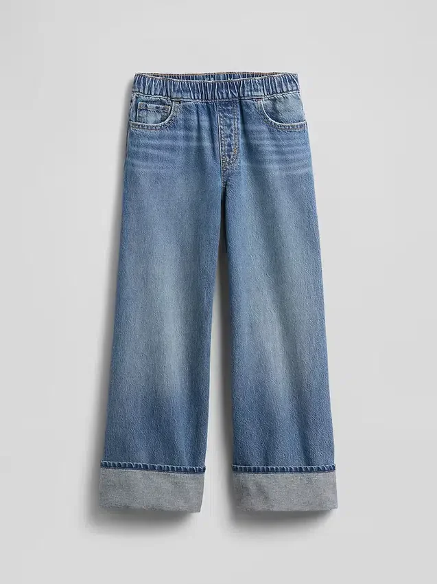 Barnjeans med låg midja, vid ben och avslappnad passform