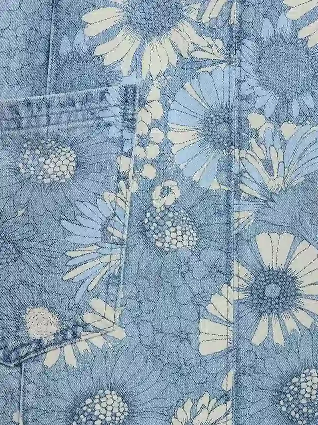 Barnkjol i denim med blommönster