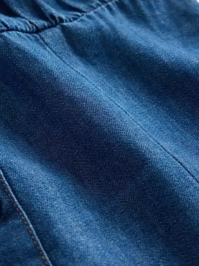 Barnklänning i denim med lågt midjeband