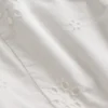 Barnklänning med hålbroderi
