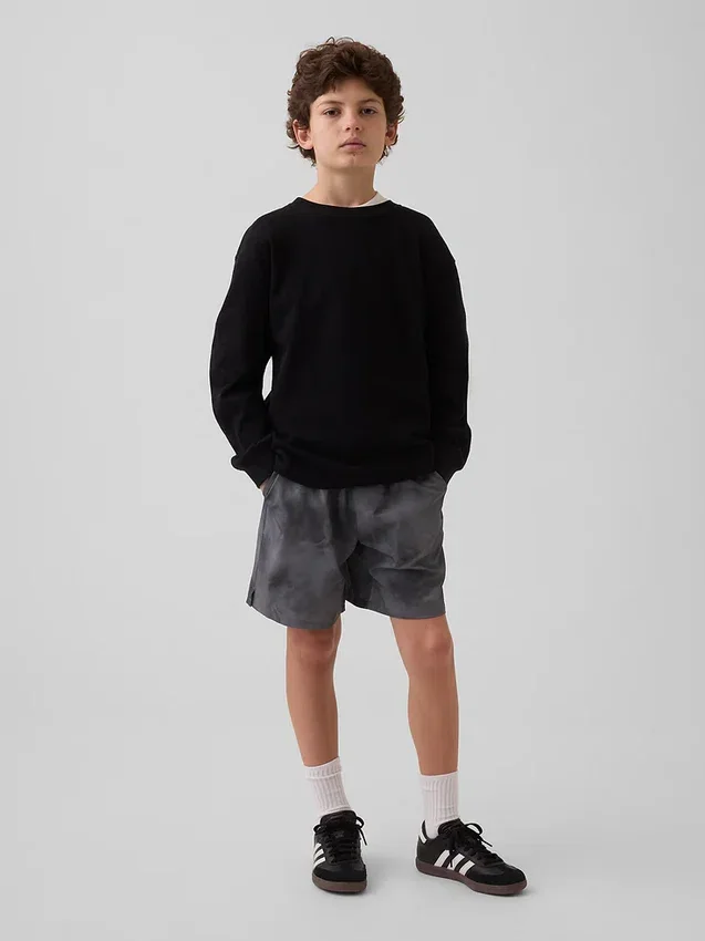 Barnshorts i avslappnad passform med snabbtorkande material