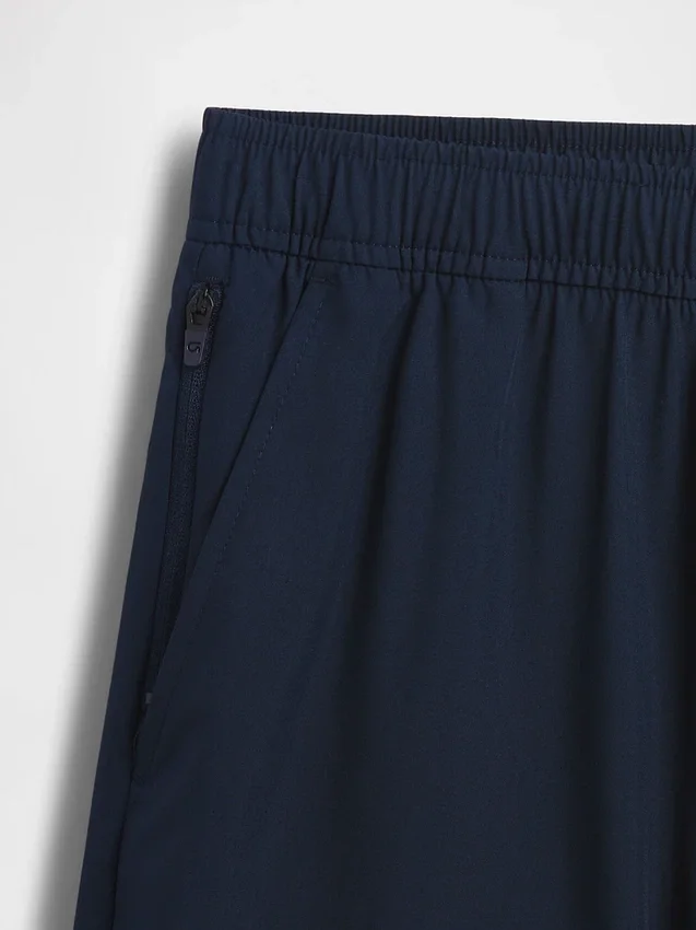 Barnshorts i avslappnad passform med snabbtorkande material