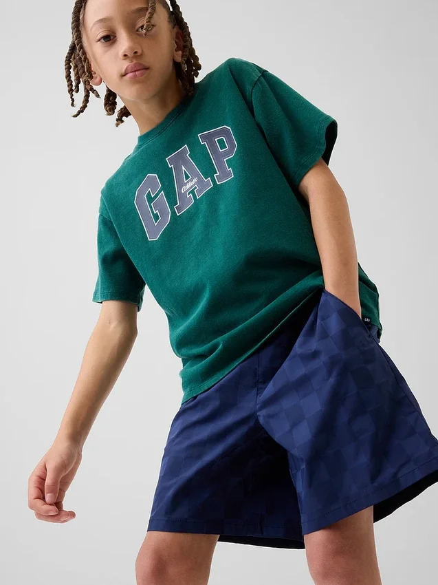 Barnshorts i avslappnad passform med snabbtorkande material
