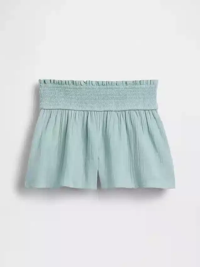 Barnshorts i bomullsgasväv med fjärilskant