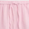 Barnshorts i bomullsgasväv med volanger