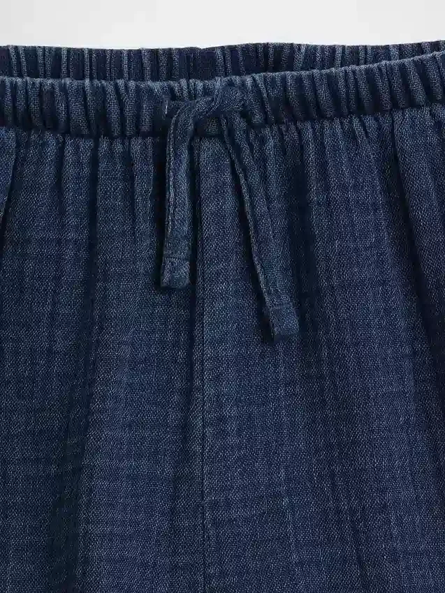 Barnshorts i bomullsgasväv med volanger