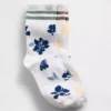 Barnstrumpor med blommönster