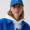 Baseballkeps med blå logotyp