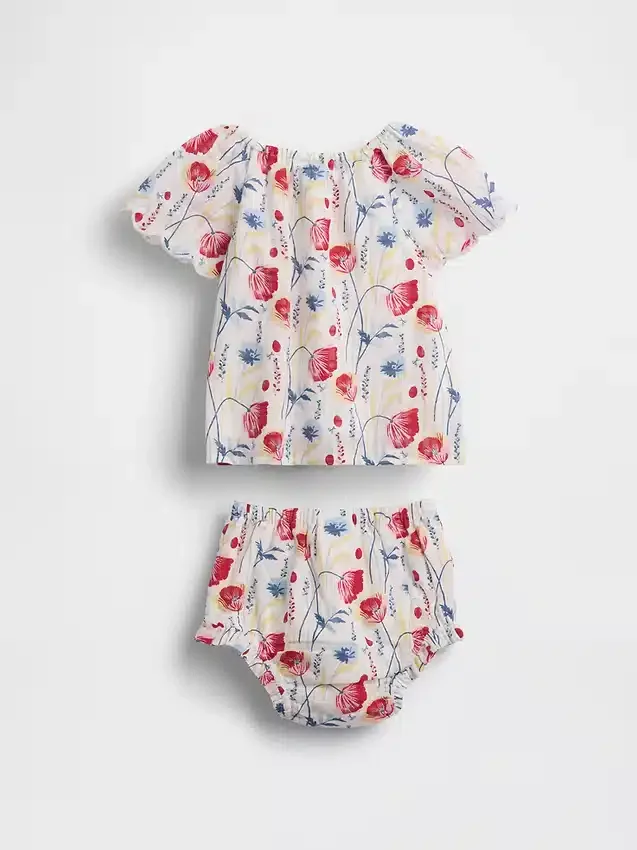 Blommigt klädeset för bebis