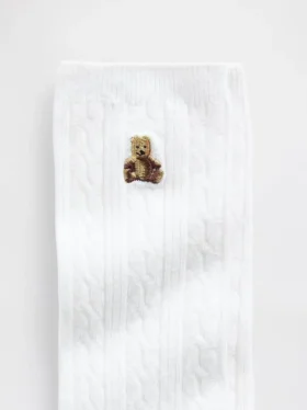 Brannan Bear-strumpor i kabelstickning