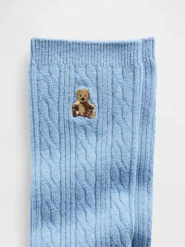 Brannan Bear-strumpor i kabelstickning