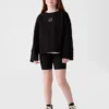 Cykelshorts i ribbad tröja för barn