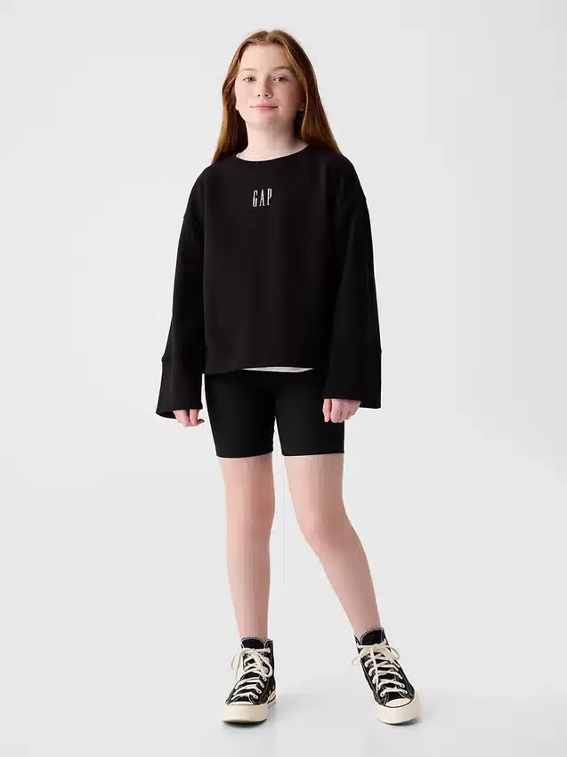 Cykelshorts i ribbad tröja för barn