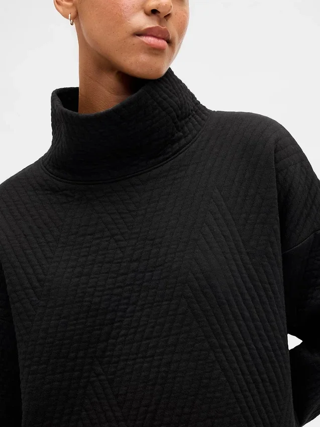 GapFit quiltad jacquardstickad tröja med trattkrage
