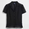 Genomskinlig peplum-top med knappar framtill
