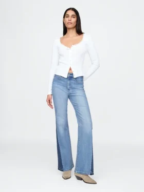 Högmidjade 70-talsinspirerade flare-Jeans med lappar