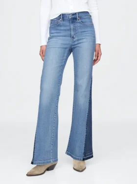 Högmidjade 70-talsinspirerade flare-Jeans med lappar