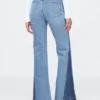 Högmidjade 70-talsinspirerade flare-Jeans med lappar