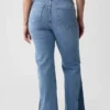 Högmidjade 70-talsinspirerade flare-Jeans med lappar