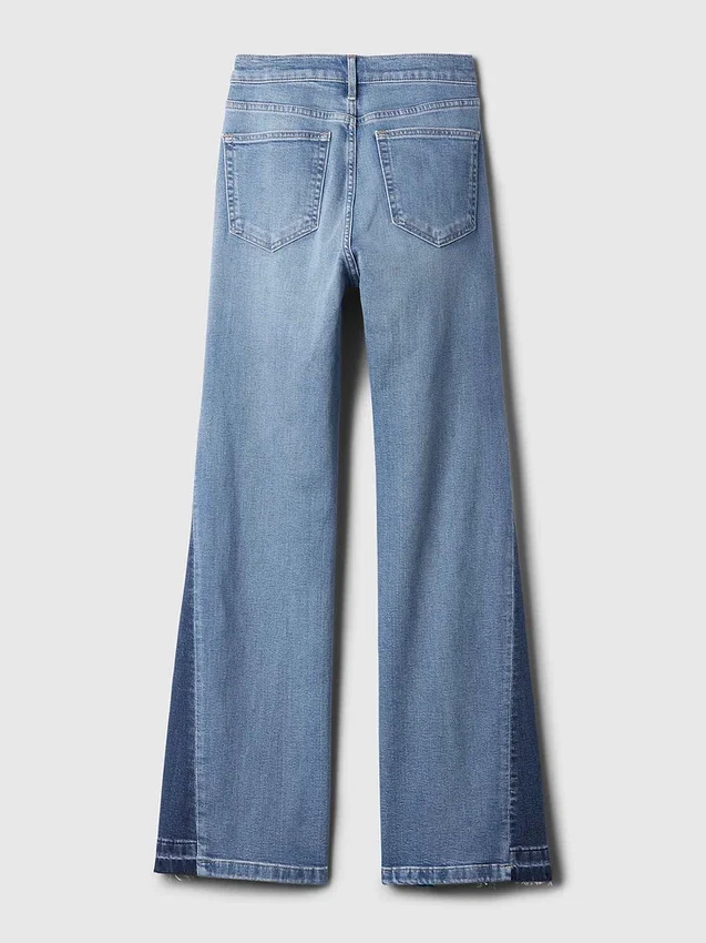 Högmidjade 70-talsinspirerade flare-Jeans med lappar