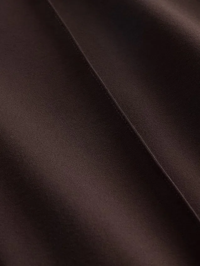 Högmidjade, dubbelstickade byxor i bootcut-modell