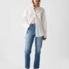 Högmidjade, raka jeans med låg framdel