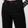Högmidjade, raka jeans med låg framdel