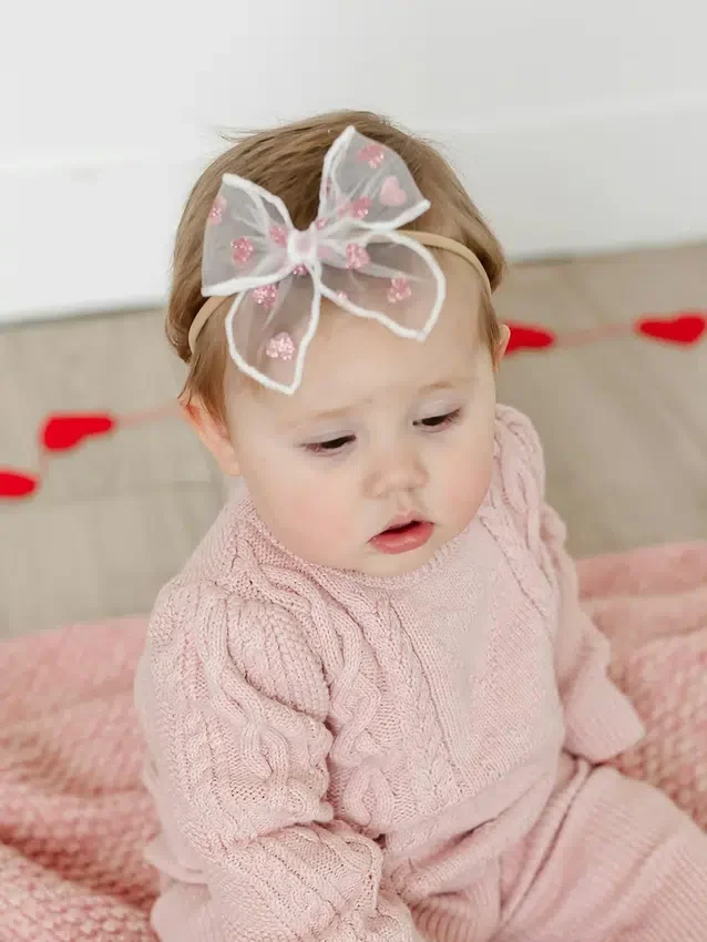 Hårbandssetet med rosetter från Taylor