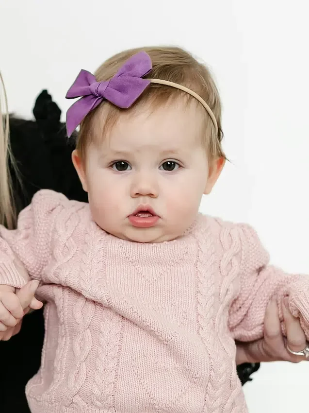 Hårbandssetet med rosetter från Taylor