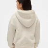 Huvtröja för barn med sherpa-foder och grafiskt logo-tryck