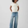 Jeans för barn med låg midja och vid ben