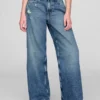 Jeans för barn med låg midja och vid ben