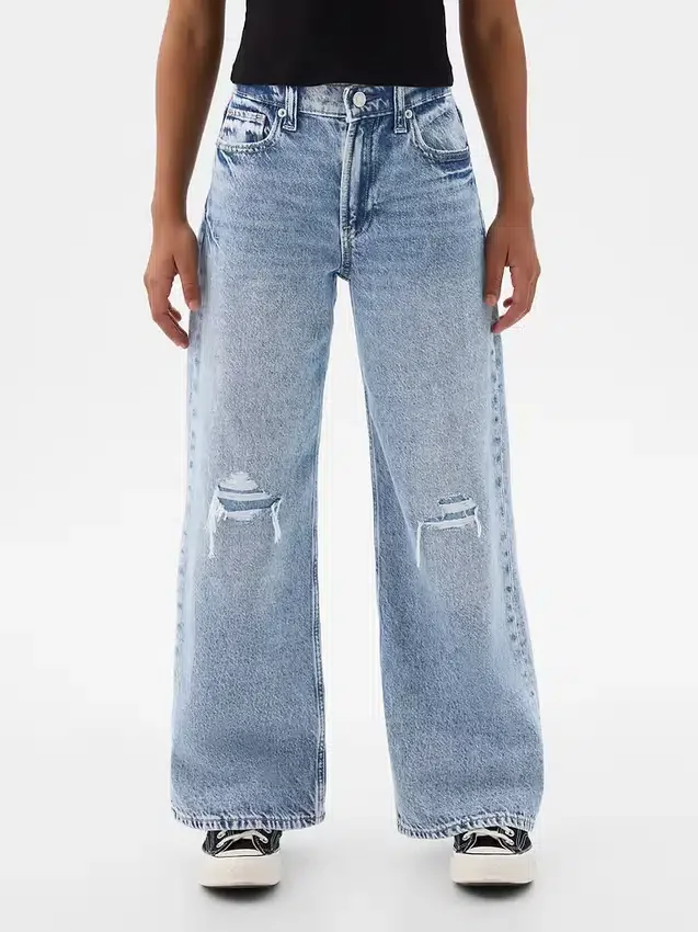 Jeans för barn med låg midja och vid ben
