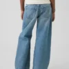 Jeans för barn med låg midja och vid ben
