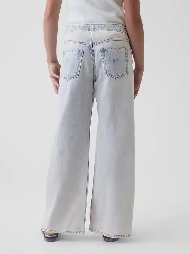 Jeans för barn med låg midja och vid ben