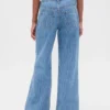 Jeans för barn med låg midja och vid ben