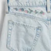 Jeans för barn med låg midja och vid ben
