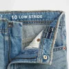 Jeans för barn med låg midja och vid ben
