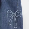 Jeans för barn med låg midja och vid ben