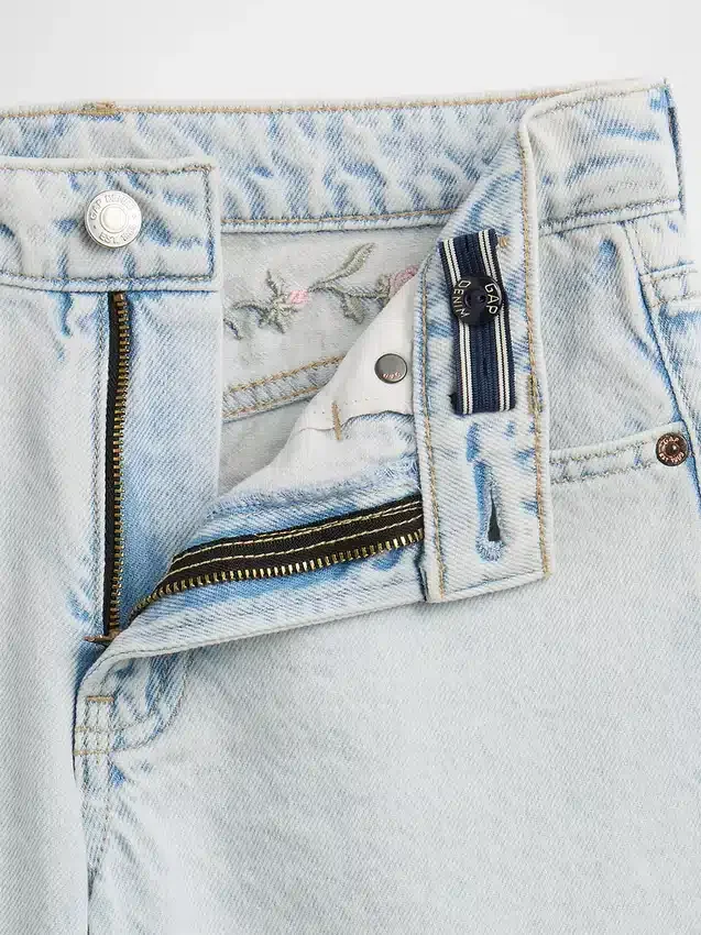 Jeans för barn med låg midja och vid ben