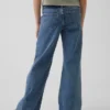 Jeans för barn med låg midja, sömmar och avslappnad flare-passform