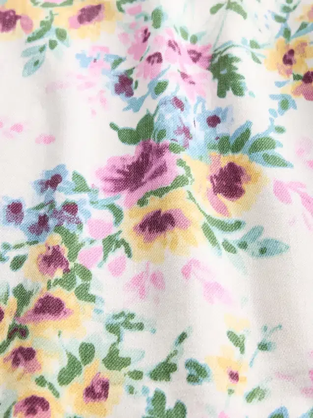 Jeans med hög midja och blommönster