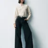 Jeans med hög midja och vida ben