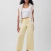 Jeans med hög midja, vid ben och ankellängd