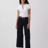 Jeans med hög midja, vid ben och ankellängd