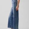 Jeans med hög midja, vid ben och ankellängd
