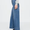 Jeans med hög midja, vid ben och ankellängd