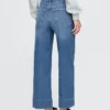 Jeans med hög midja, vid ben och ankellängd