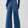 Jeans med hög midja, vid ben och ankellängd