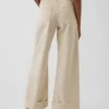 Jeans med hög midja, vid ben och ankellängd